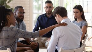 Grief support group with five people