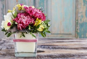 flower arrangement with purple and yellow flowers