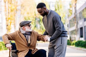 Shows a male nurse providing palliative care