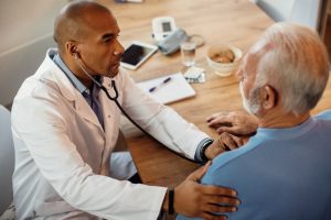 shows man talking to his doctor about his health