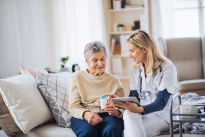 Illustrates how an elderly woman receives hospice care at home