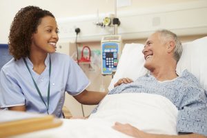 Shows man receiving care at a hospital