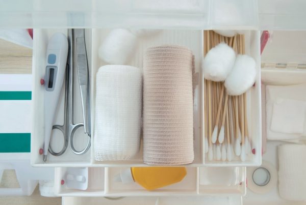 Assortment of medical supplies, like gauze, bandages, and scissors